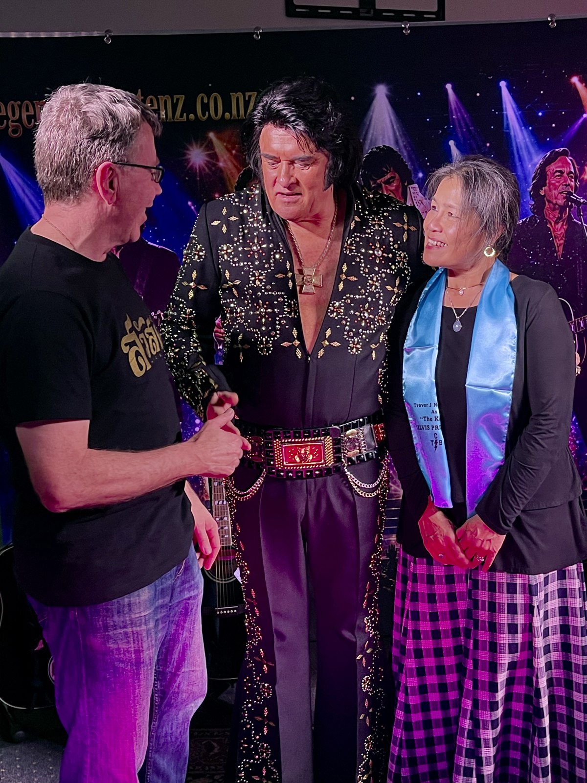 Trevor Needham in his Elvis jumpsuit meeting fans at a live show